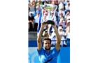 EASTBOURNE, ENGLAND - JUNE 21:  Feliciano Lopez of Spain celebrates with the trophy after winning the Men's Final between Richard Gasquet of France and Feliciano Lopez of Spain at the Aegon International at Devonshire Park on June 21, 2014 in Eastbourne, England.  (Photo by Ben Hoskins/Getty Images)